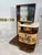 A sophisticated Italian bar cabinet attributed to Ico Parisi, crafted in the 1950s. The design combines geometric elegance...