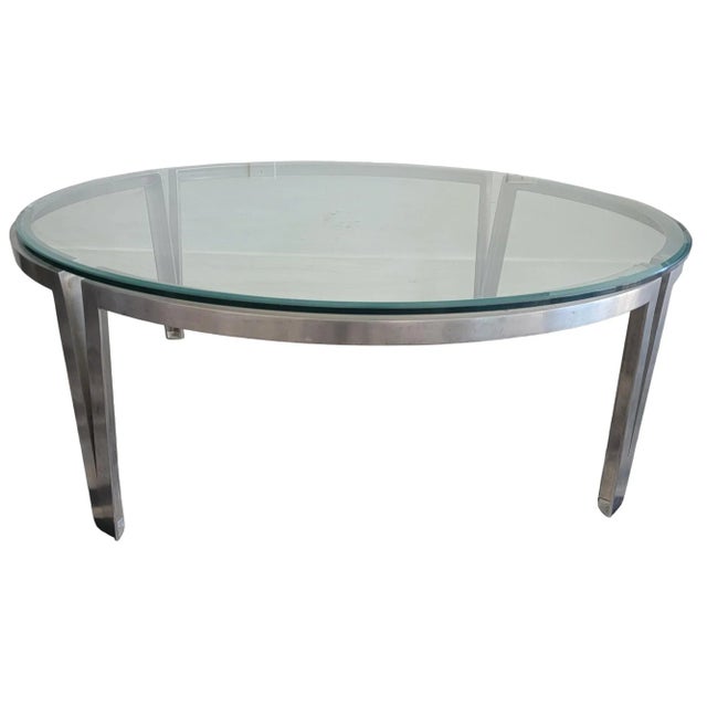 Italian Metal and glass Contemporary Coffee Table. Very strong and sturdy base with a thick glass top. the glass top is a...