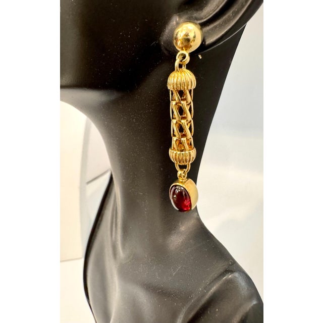 Natural Amethyst & Garnet Simple Hanging / Dangling Earring in 14 Kt Yellow Gold Cute Dangling earrings which has Amethyst...