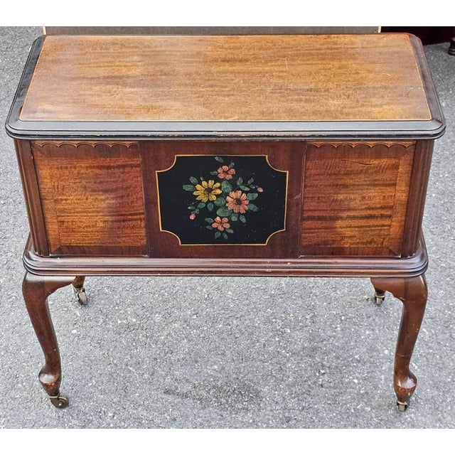 Early 20th Century antique Martha Washington-style sewing cabinet, a type of functional storage table popular in the early...