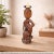 Breathe the soul of history into your home with this magnificent Hand Carved Wood Elephant Statue on Metal Stand. A true...