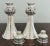 A stunning pair of modernist style Elizabeth II sterling silver candlesticks. This style is called the "Lorimer Pattern"...