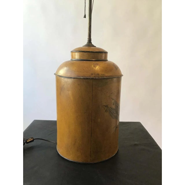 Pair of 1940s hand painted classical tole lamps.