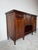 Elegant antique Edwardian buffet or sideboard crafted from solid mahogany, featuring beautifully hand-carved floral and...