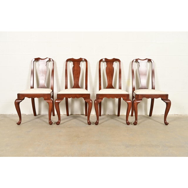 An outstanding set of four Queen Anne or Georgian style dining chairs By Henkel Harris USA, Circa 1970s Solid cherry wood...