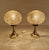 Pair of vintage space age table lamps featuring an amber tint cocoon like globe glass shade wiith sprinkled structure on...