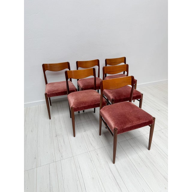 Elegant set of six danish dining chairs crafted in the 1960s. the chairs feature beautifully shaped backrests with a...
