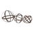A sculptural trio of cast iron garden spheres, each formed from intersecting iron bands creating an openwork orb...