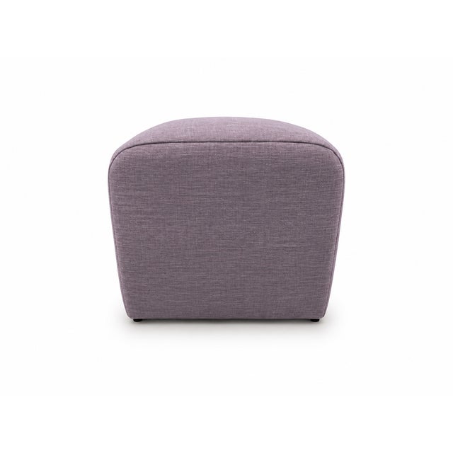 A sleek contemporary statement piece, this custom ottoman showcases a sophisticated architectural profile defined by...