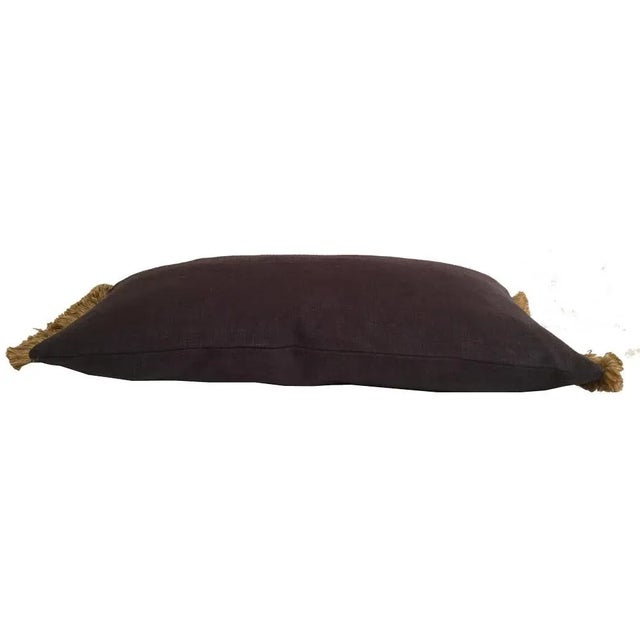 For this casual pillow we took our favorite stone washed linen in a deep charcoal and trimmed it with a caramel color...