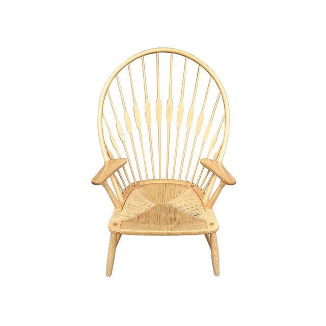 A "Peacock" chair designed by Danish designer Hans Wegner (1914-2007) for the Danish furniture company, Johannes Hansen....