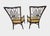 A beautiful pair of script armchairs designed by Barbara Barry for The McGuire Company. Color: Dark Tobacco Fabric:...