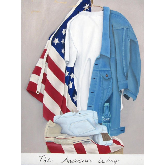 A nostalgic 1994 oil painting that distills everyday Americana—flag, denim, tee, and a glass Coke—into a tidy, quiet...
