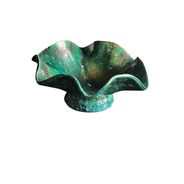 An incredible Raku pottery vase with a gorgeous green color. This would make an interesting centerpiece. Dress up your...