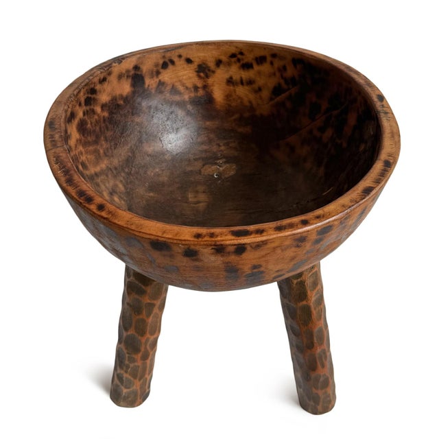 Vintage hand carved wooden bowl on three tall legs. Unique piece for display on its own or filled with items of your...