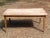 A wonderfully honest early 19th century provincial farmhouse table featuring a beautifully timeworn plank top raised on...