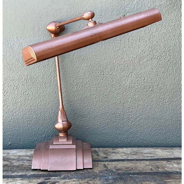 This vintage Flexo task lamp is a masterful marriage of Mid-Century Modern utility and Art Deco architectural influence....