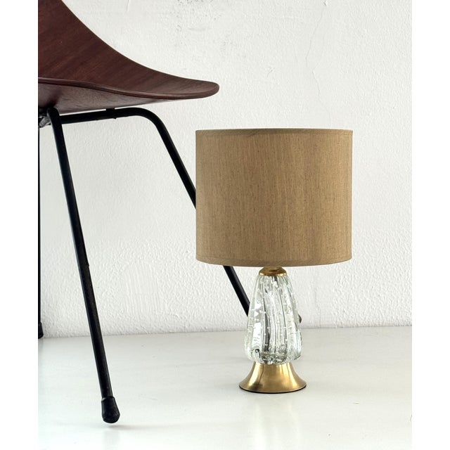 Italian Murano Glass and Brass Table lamp, produced in the 1960s. Tiny table lamp, restored and equipped with new electric...