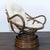 Add a cozy touch to your lounge area with this vintage rattan chair. The sturdy circular rattan frame and soft, light-...