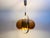 Vintage pendant lamp by Temde from the 1970s, featuring a stylish design crafted from acrylic glass and brass. This...