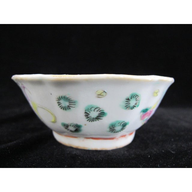 Very sweet vintage Chinese Nyonya porcelain rice bowl with lobed rim. White backdrop showing colorful enamel hand painted...