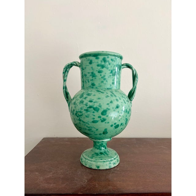 Inspired by the vessels that transported oil and wine across the Mediterranean for thousands of years, the green Amphora...
