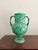 Inspired by the vessels that transported oil and wine across the Mediterranean for thousands of years, the green Amphora...
