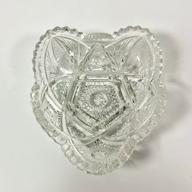 Between 1876 to 1916 American glass producers hand cut glass with sawtooth edging that became known as American Brilliant...