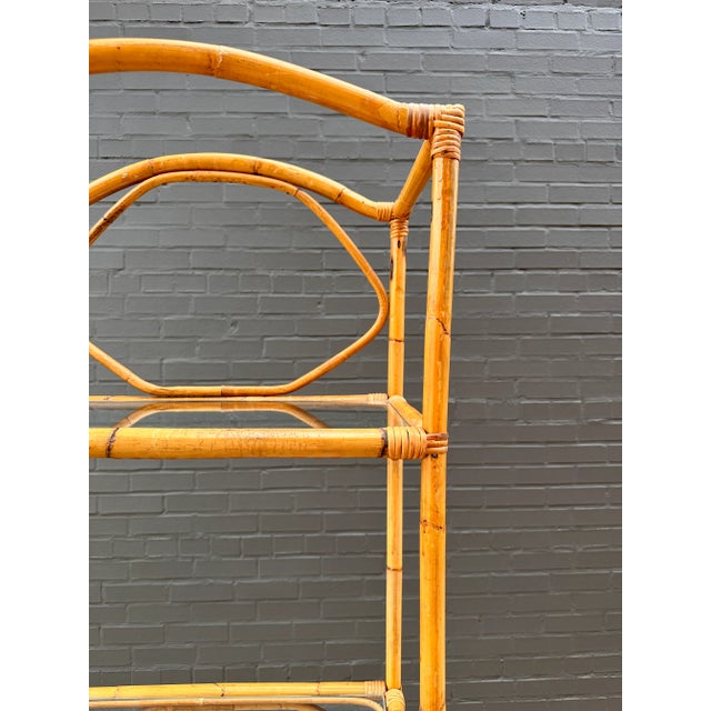 Crafted with meticulous attention to detail, this Étagère showcases a sturdy bamboo frame that exudes a rustic allure....