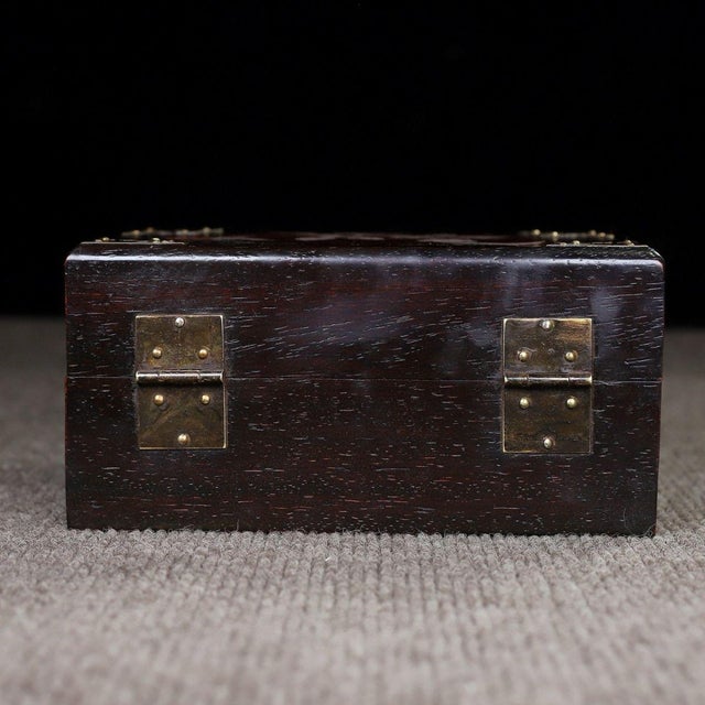 This exquisite vintage jewelry box is a beautiful example of traditional Asian craftsmanship. Crafted from dark, richly...