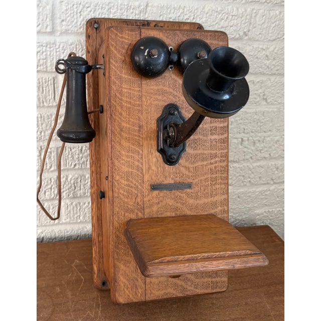 Antique Wall Phone, with Crank and Chimes 21" tall x 11" wide , 14" deep. Crank works. Opens with a flathead screwdriver....