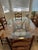 Textile 62" Oblong Beveled Glass Table With a “Organic Modernism" Base and Six (6) Wooden Ladder Back and Rush Chairs For Sale - Image 7 of 11