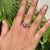 This elegant floral cocktail ring features 1.18 carats of vivid rubies, crafted in 14K yellow gold. The rubies measuring...