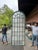 Antique, two-part arched double hung windows of impressive height having wood mullions and frame. Glass is opaque. Perfect...
