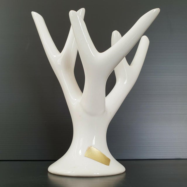 Good condition. A small chip on the outer edge of one branch. Height 23.5 cm. Length 19.5 cm. Width 12.5 cm. Very...