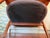 An exceptional, striking pair of mid-century modern sculptural barrel-back lounge chairs, circa 1960s. Embodying the...
