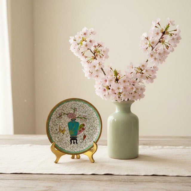 This vintage Chinese cloisonné trinket dish showcases the intricate wirework and colorful enamel artistry that made...