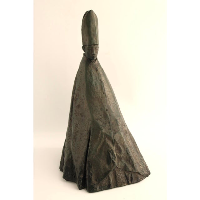 Vintage MCM decorative recasting by Austin Productions of Giacomo Manzu's famous sculpture of Cardinale Seduto, which...