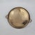 Vintage round brass gallery tray features an elegant pierced railing and ornate floral-detailed handles. The polished...