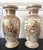 A pair of spectacularly decorated Japanese ceramic vases from late Meiji period circa 1900s by Kozan, a maker in Kyoto...