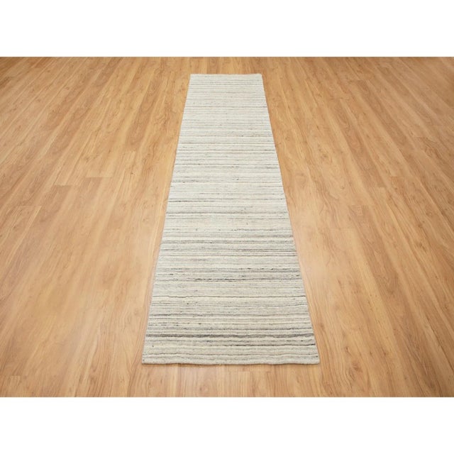 "This fabulous Hand-Loomed carpet has been created and designed for extra strength and durability. This rug has been...