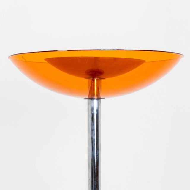 Single Modernist floor lamp. Original Plexiglass shade with chromed metal shaft and base. Dimensions: H:70¾ Diameter Top:...