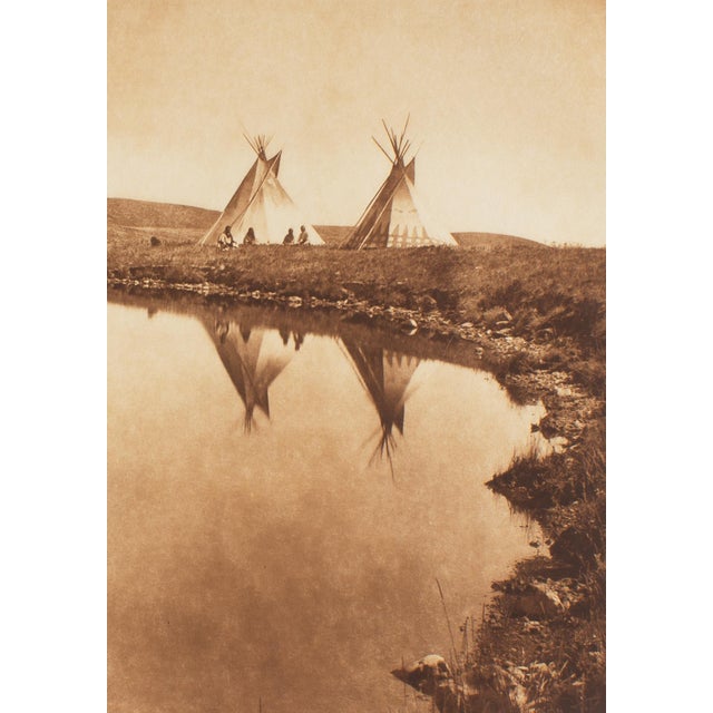 A photogravure restrike after a photograph by American photographer Edward Curtis (1868-1952). Titled "At the Water’s Edge...