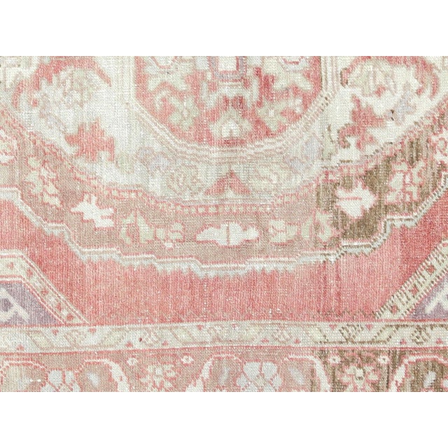 This beautiful vintage Turkish Oushak Rug is hand-knotted with 100% wool on a wool foundation to provide a soft, warm...