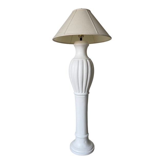 This striking 1980’s vintage plaster floor lamp features a sculptural, classically inspired form with elegant fluted...