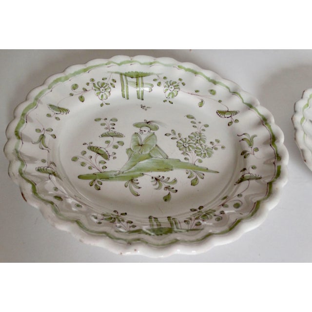 Pair of early 19th-Century French faience plates of lobed shape, hand painted in lovely spring green color. Light purple...