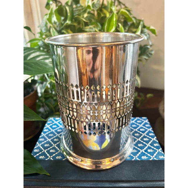This silver plate wine bottle holder is an elegant way to serve your wine at the table. Made in the 1960’s by Sheffield...