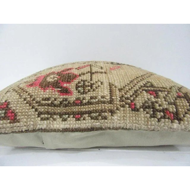 This is a pillow cover made from a vintage kilim rug. The piece was properly washed and ready to use. Pillow inserts not...