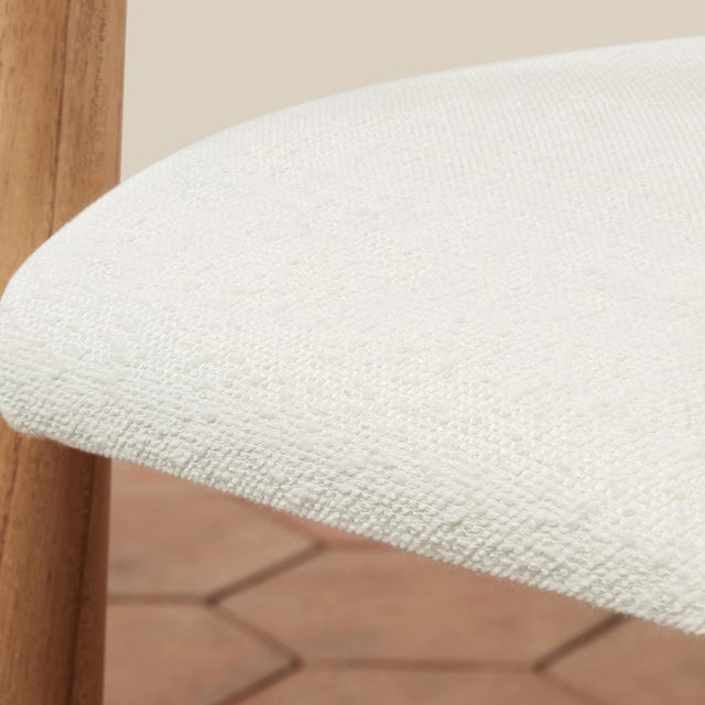 Whether your dining space is formal or laid back, this dining chair’s chunky white cedar wood frame and distinctive...