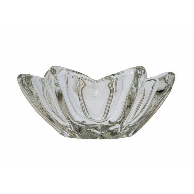 This elegant Daum crystal bowl, marked on the lower edge Daum France, is a substantial and finely crafted piece, weighing...